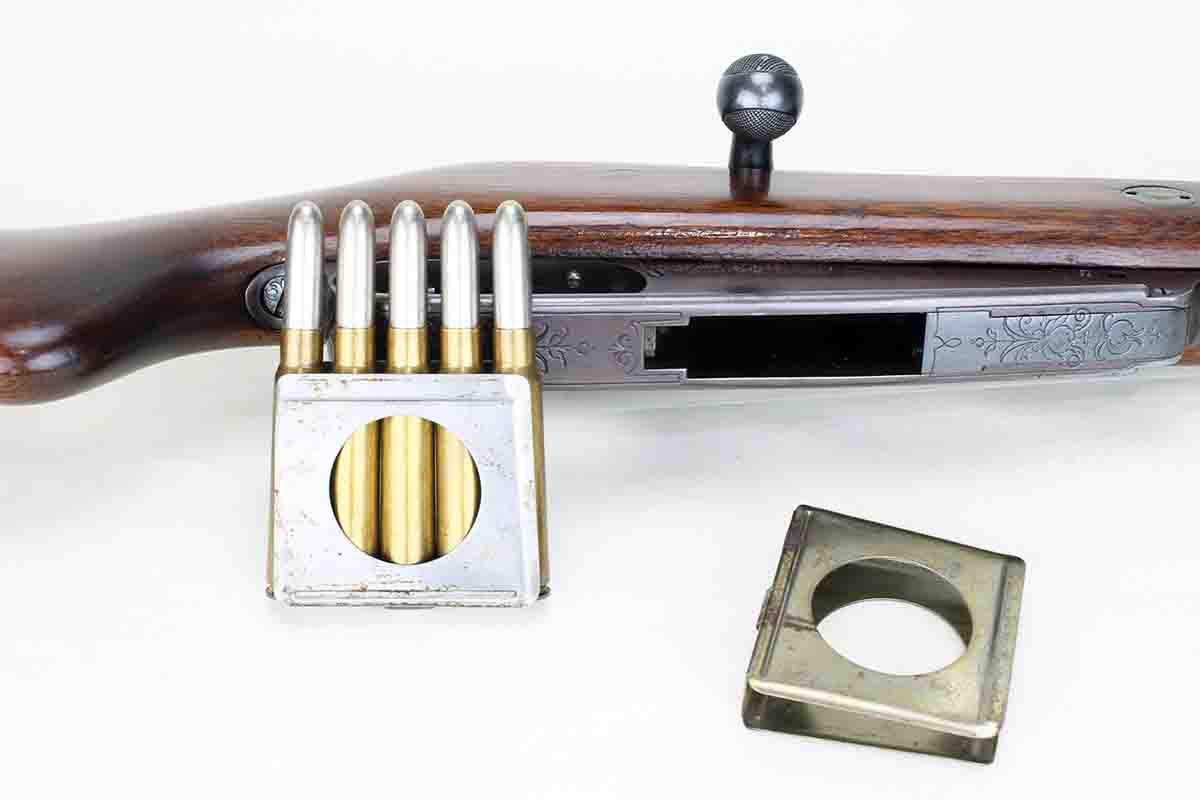 The Mauser-Mannlicher action required the use of five-round enbloc clips that fall out of the bottom of the action when chambering the last round.